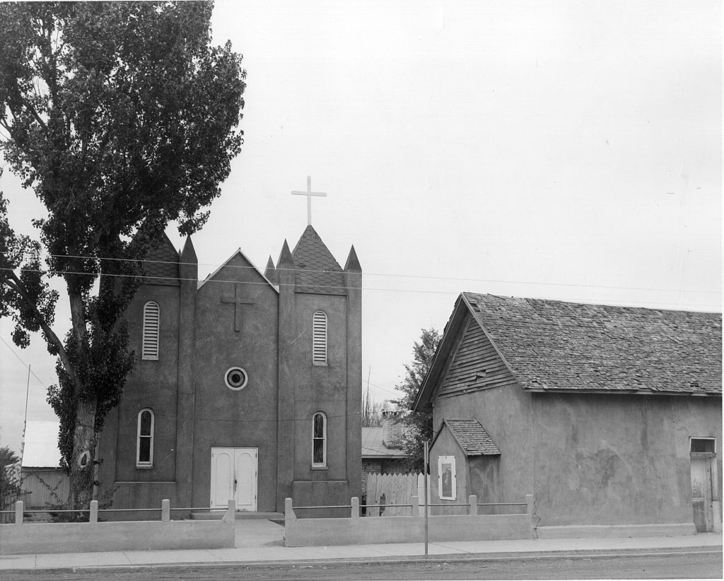 The new church, left, is shown shortly after it was built, standing beside the old church, right. The church was built in the late 1930s and dedicated by Bishop Bernard Espelage, OFM, in the early 1940s. The old church stood until the 1970s and served for many years as the parish hall.