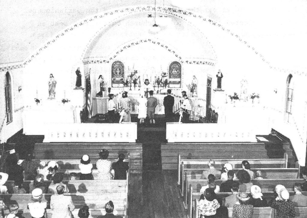 The wedding of Mary Lou Keenan to Fred Edwards, August 13, 1949. Celebrant was Father Theodosius Meyer. Servers were Bill Schnorr and Tim Foster. Seated in pew on left is Sister Margaret Mary.