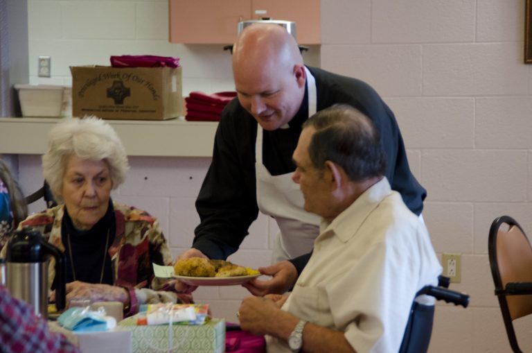 Priests Serve Meals to Elderly in Honor of St. Joseph’s Feast
