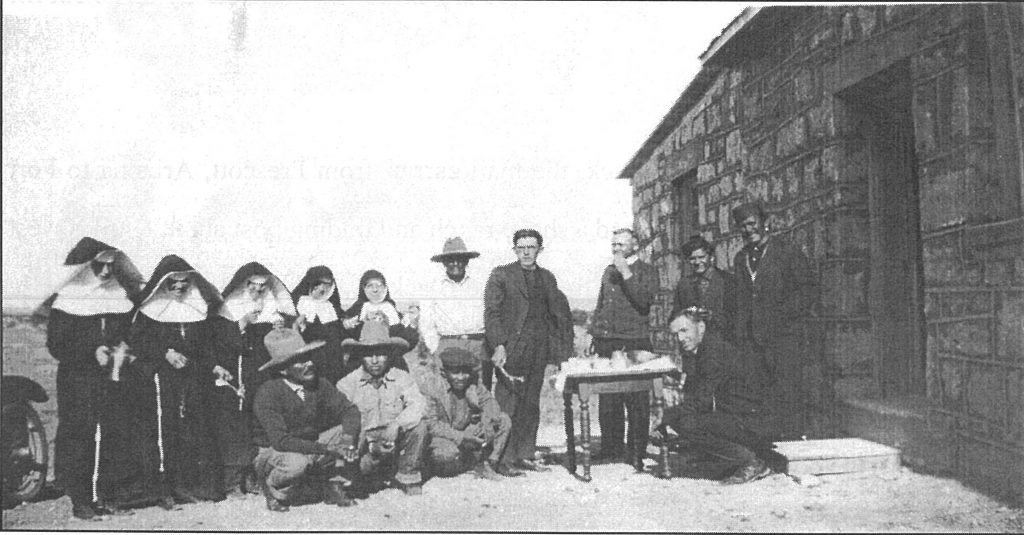 The rear of the church. If you look closely, the man on the far right is Nakai Chee, who donated the land the church is situated on. He died on July 27, 1958 and is buried on the property.