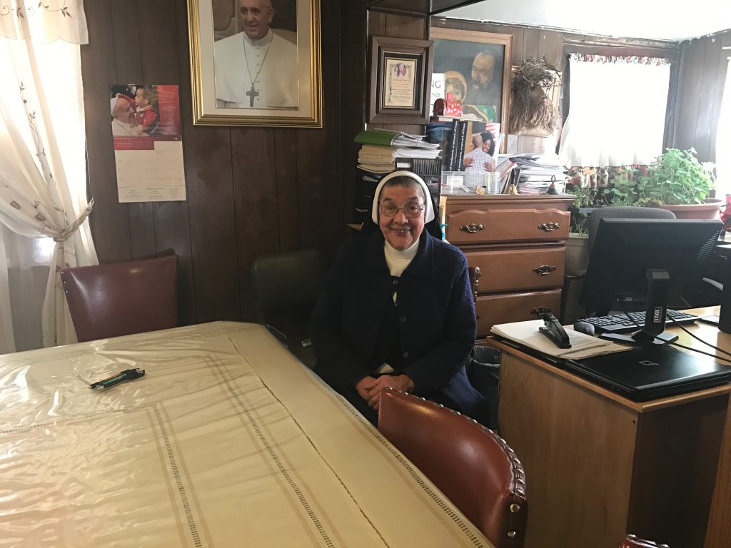 Mother Magda, in the room that serves as both an eating area and an office.